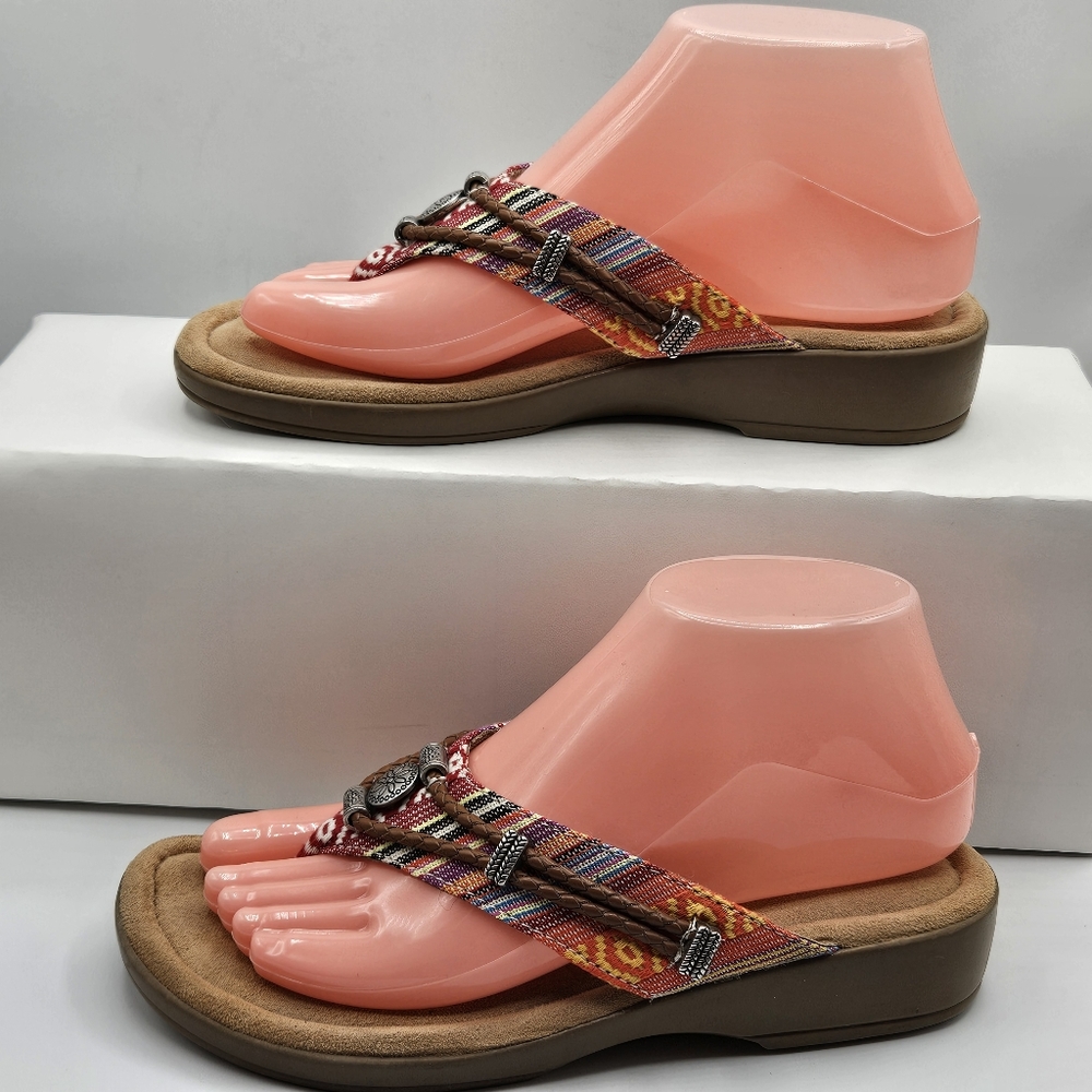 Minnetonka between the toe thong sandals size 7